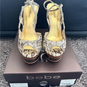 Bebe Beige and Black Platform Sandals